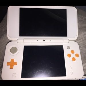 Nintendo 3DS with games and charger. No stylus.